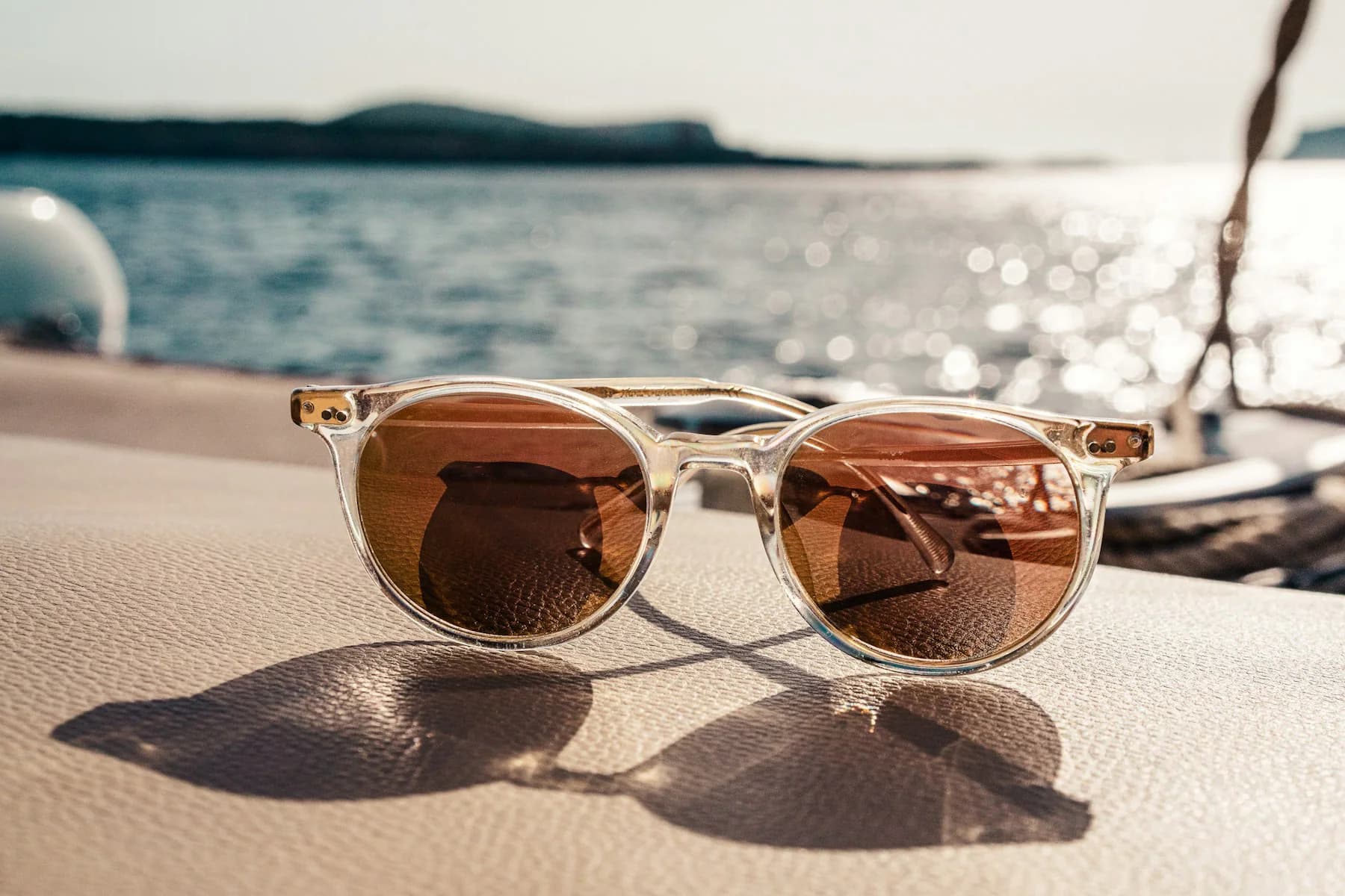 Tortoiseshell sunglasses on a sunny beach
