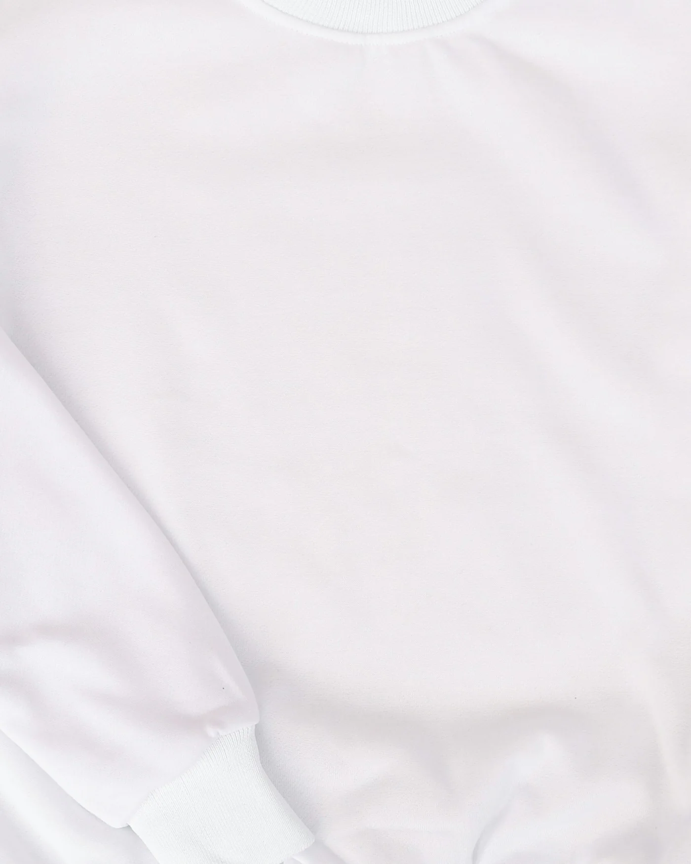 Ivory crewneck sweatshirt laid flat — detail